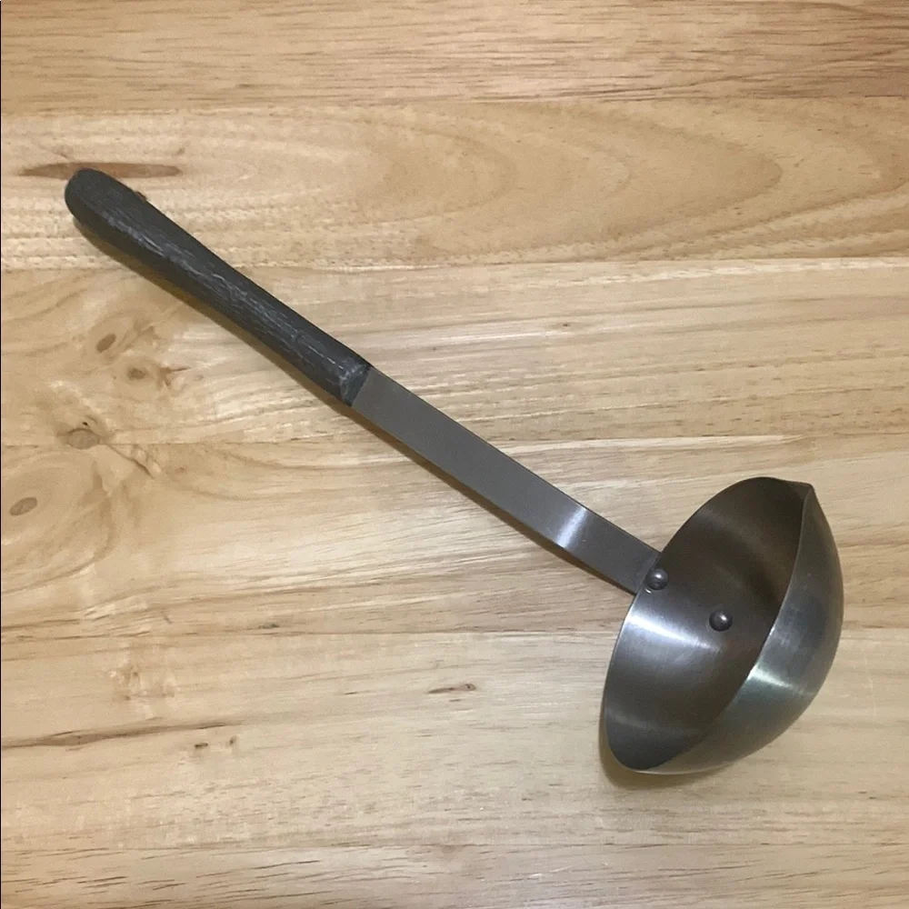 Stainless Steel vintage Ladle with cool sculpted handle
